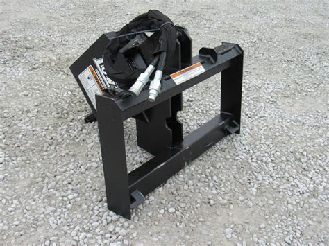 cat skid steer post hole digger|skid steer post hole attachment.